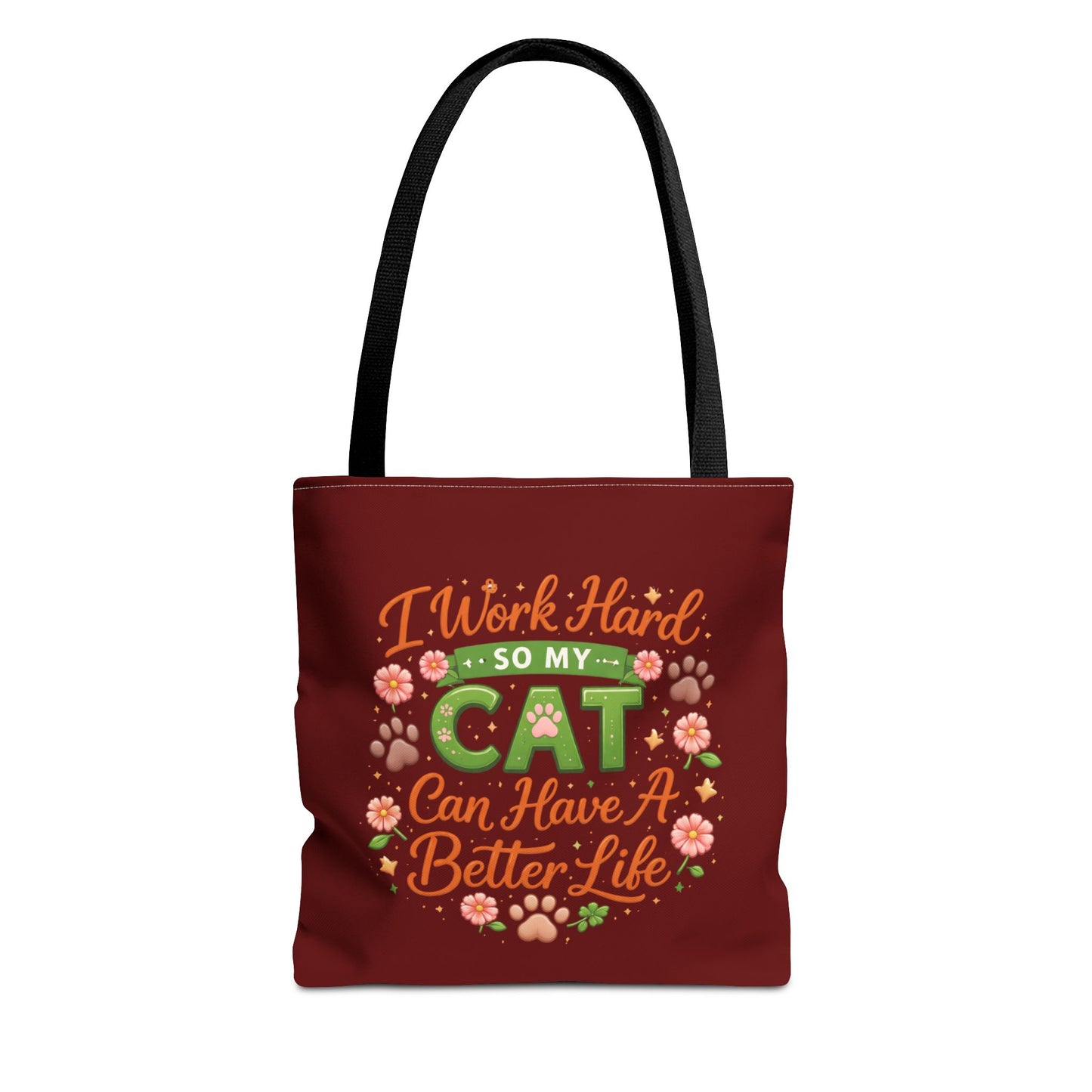 Red tote bag with humorous text and cat-themed graphics on a white background