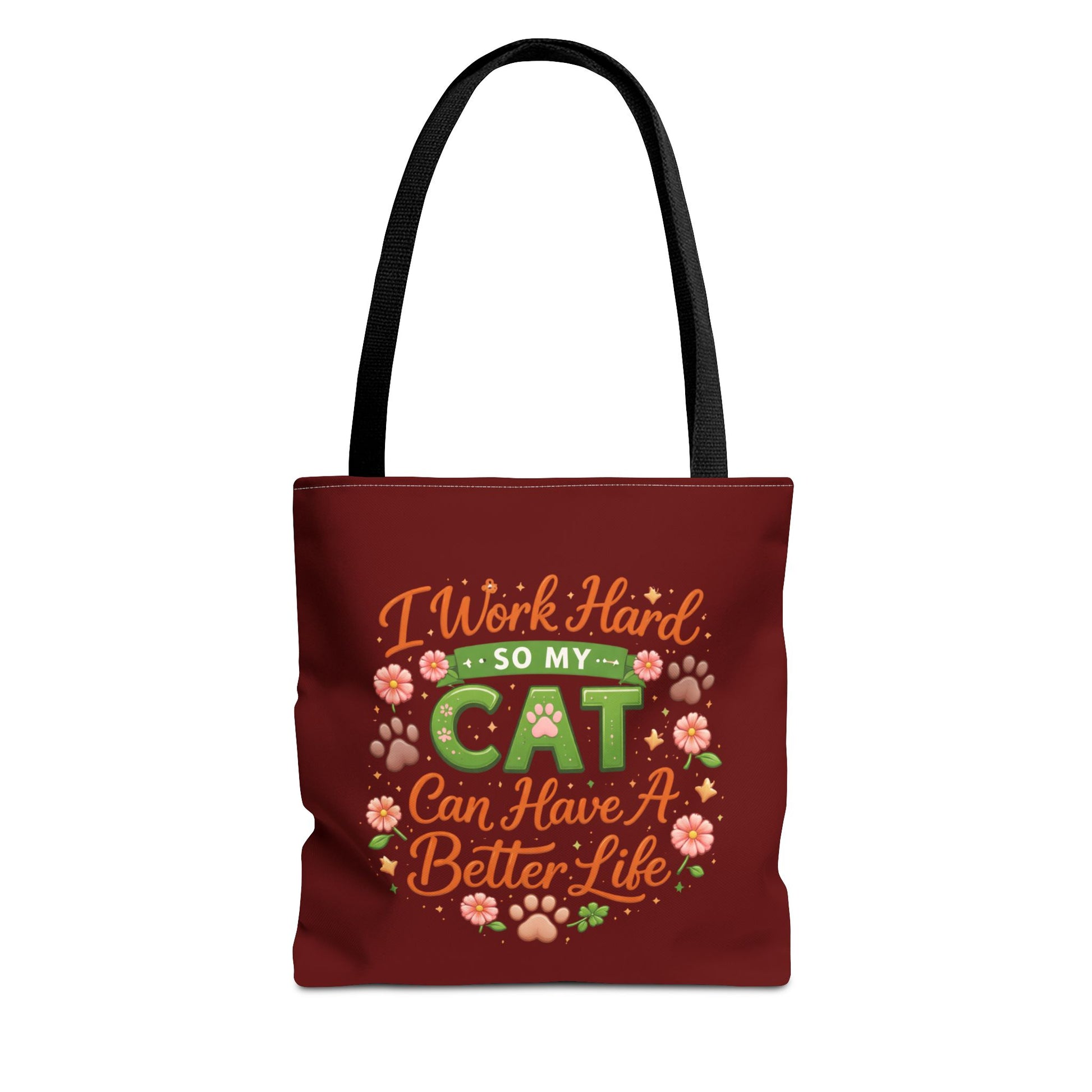 Red tote bag with humorous text and cat-themed graphics on a white background