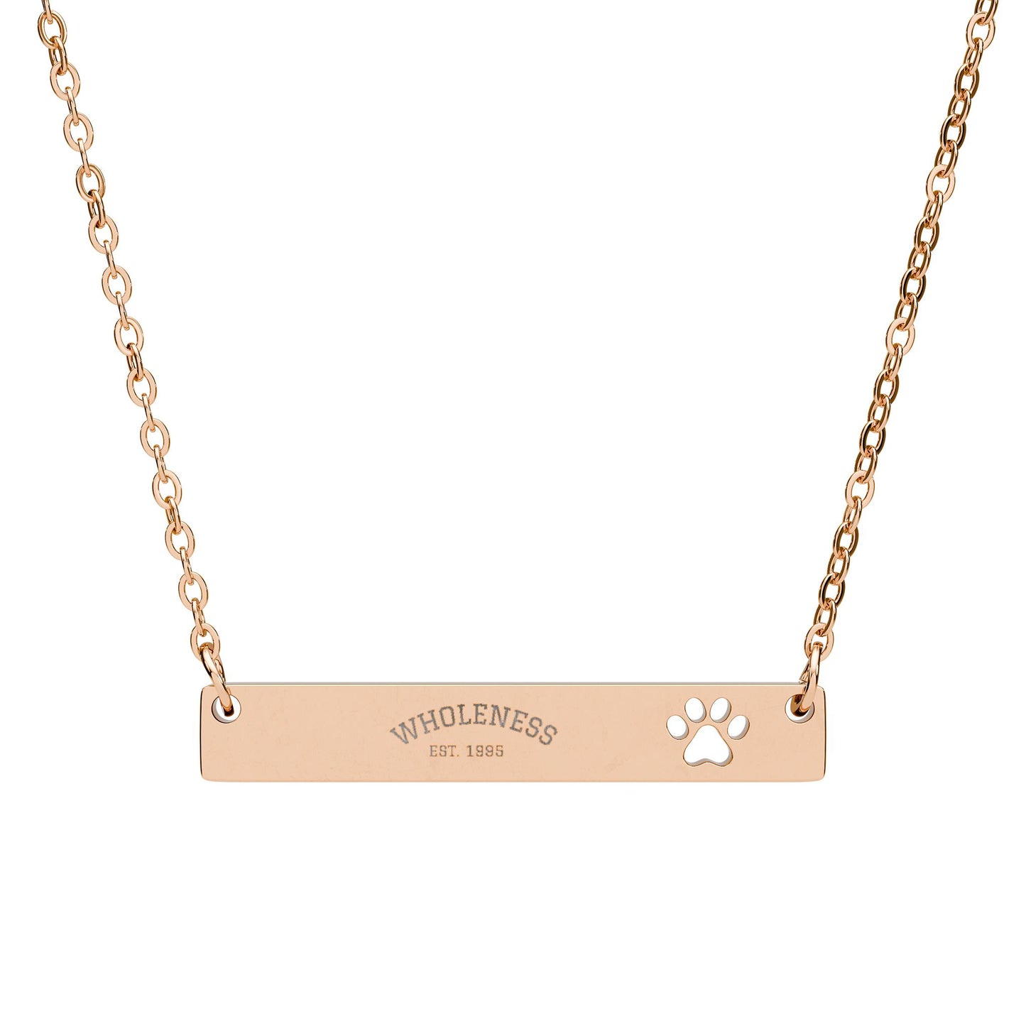 Rose gold necklace with 'WHOLENESS' and cute cat-paw print design on a white background